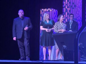 Mr. Finney Receiving Teacher of the Year Award at NYSCATE Awards