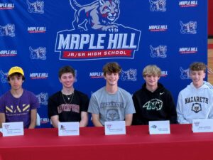 Maple Hill seniors at college athletics letter of intent signing ceremony